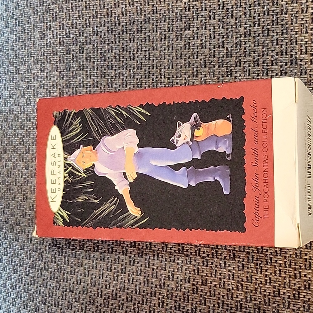 #1 Vintage Hallmark Keepsake Disney Ornament.  Captain John Smith and Meeko